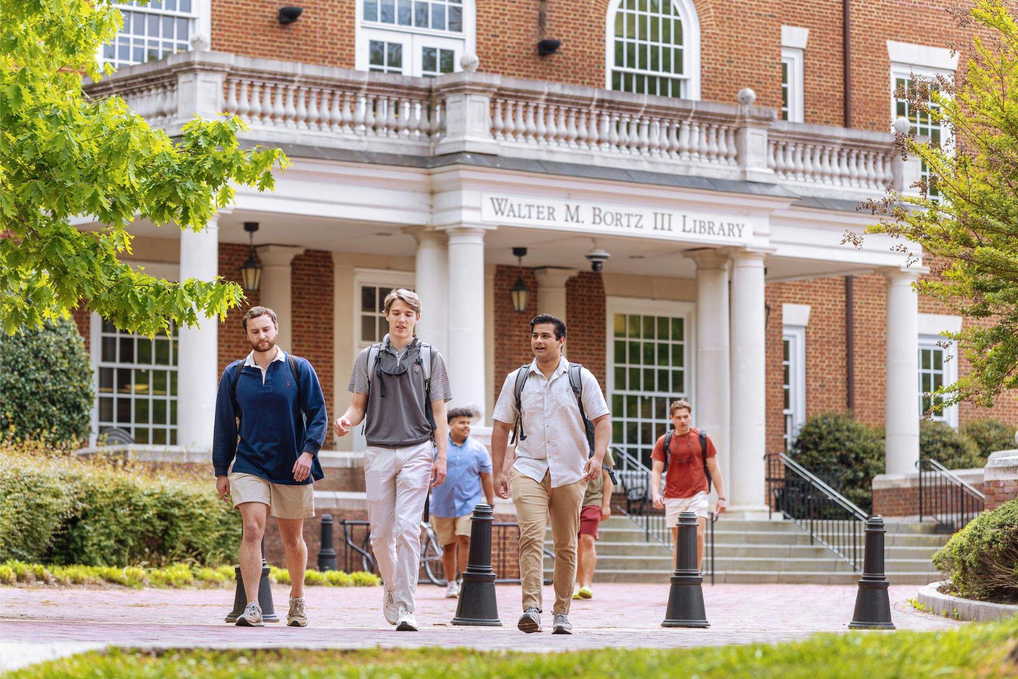 college students walking on campus