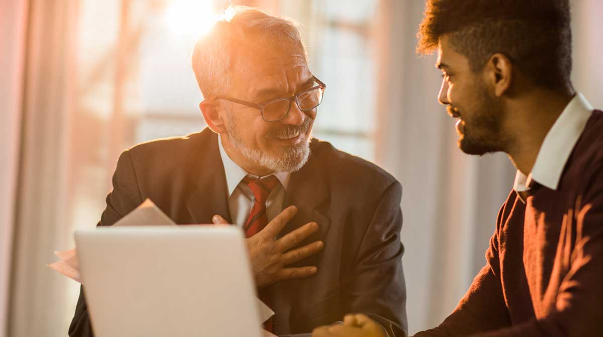 old man and young man talking