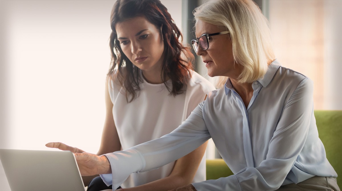 two woman sitting