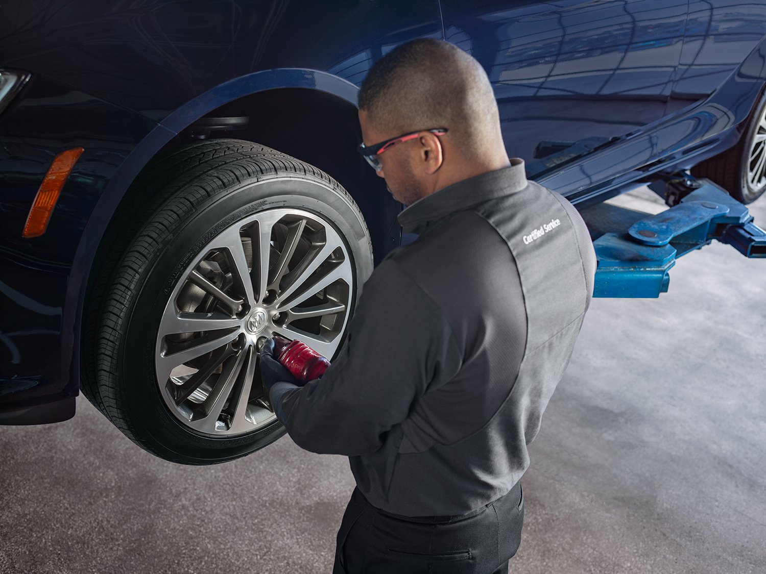 car tech working on a car