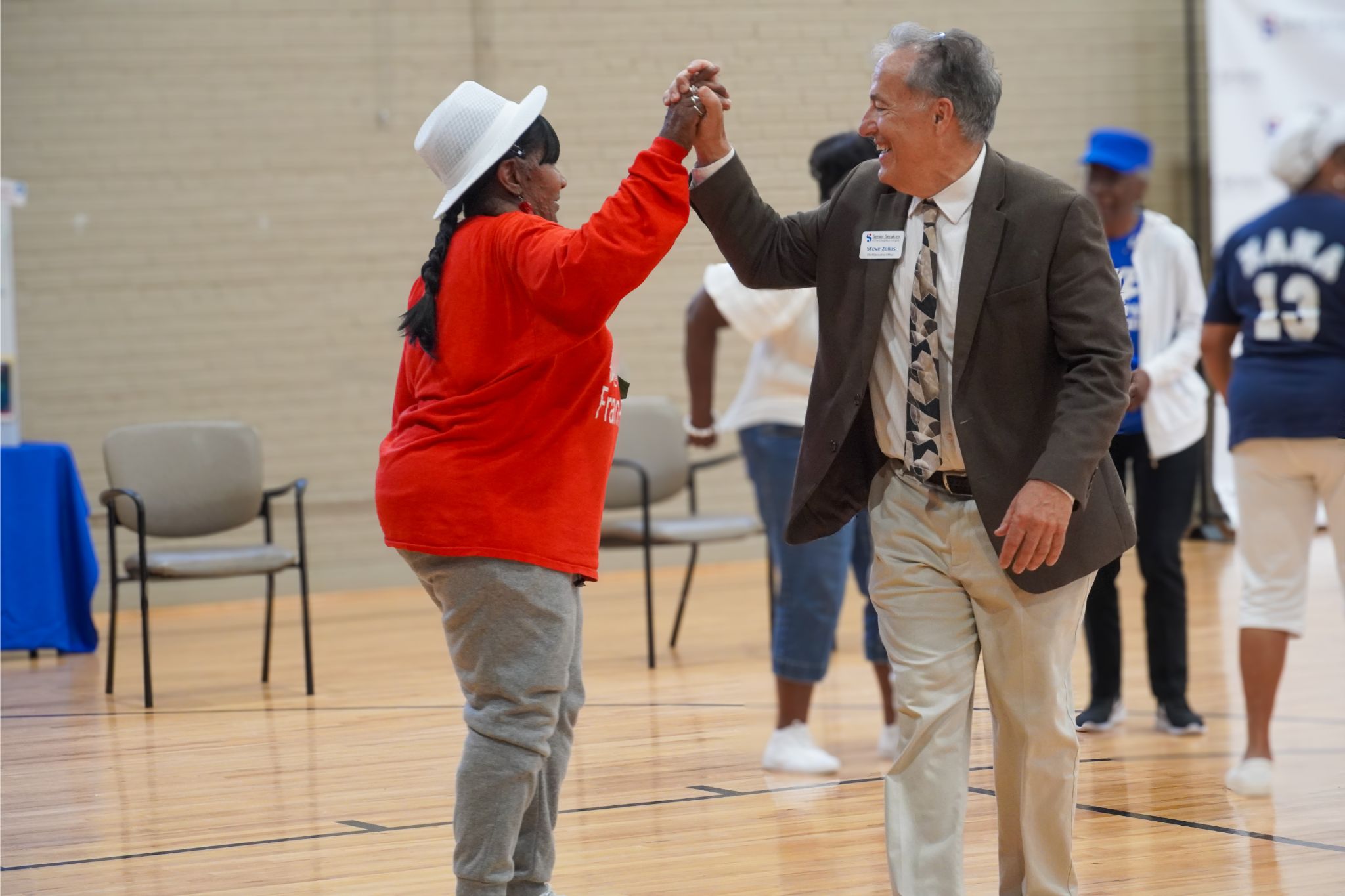 two people high fiving