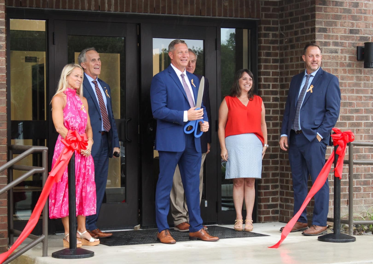 image of ribbon cutting at sandbridge school