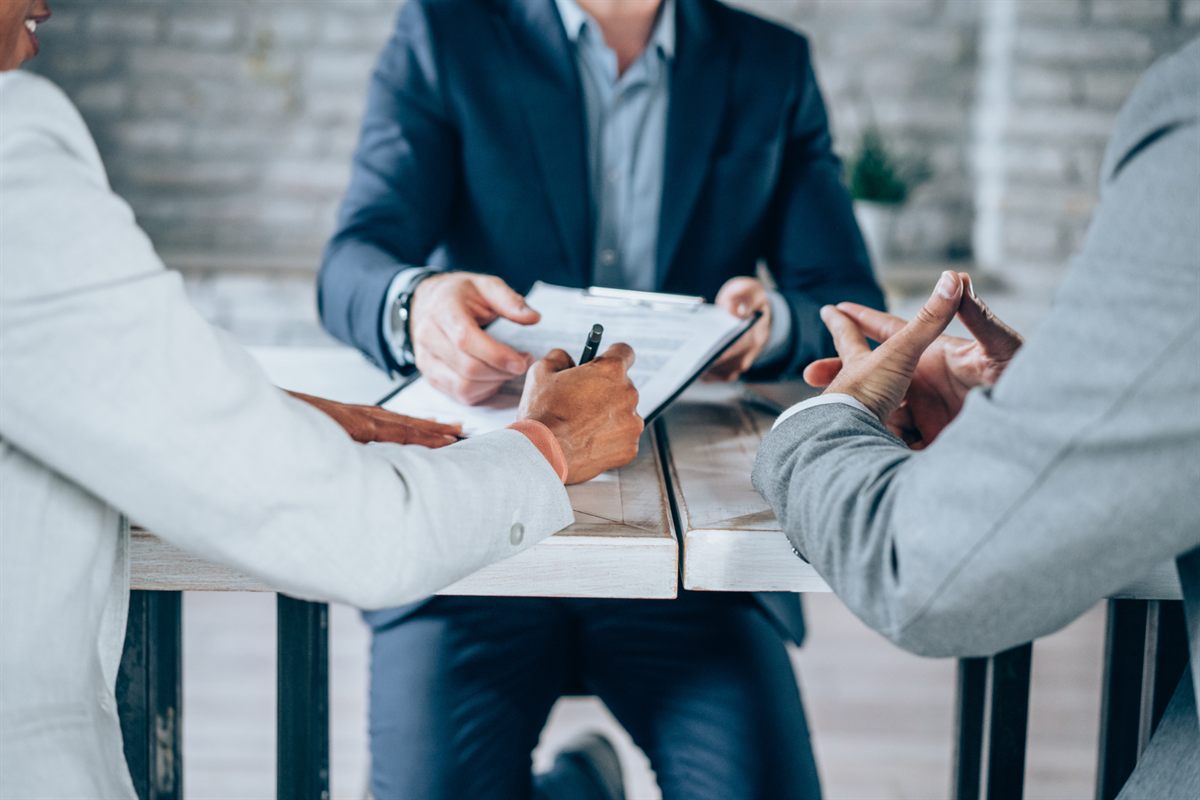 3 men sitting