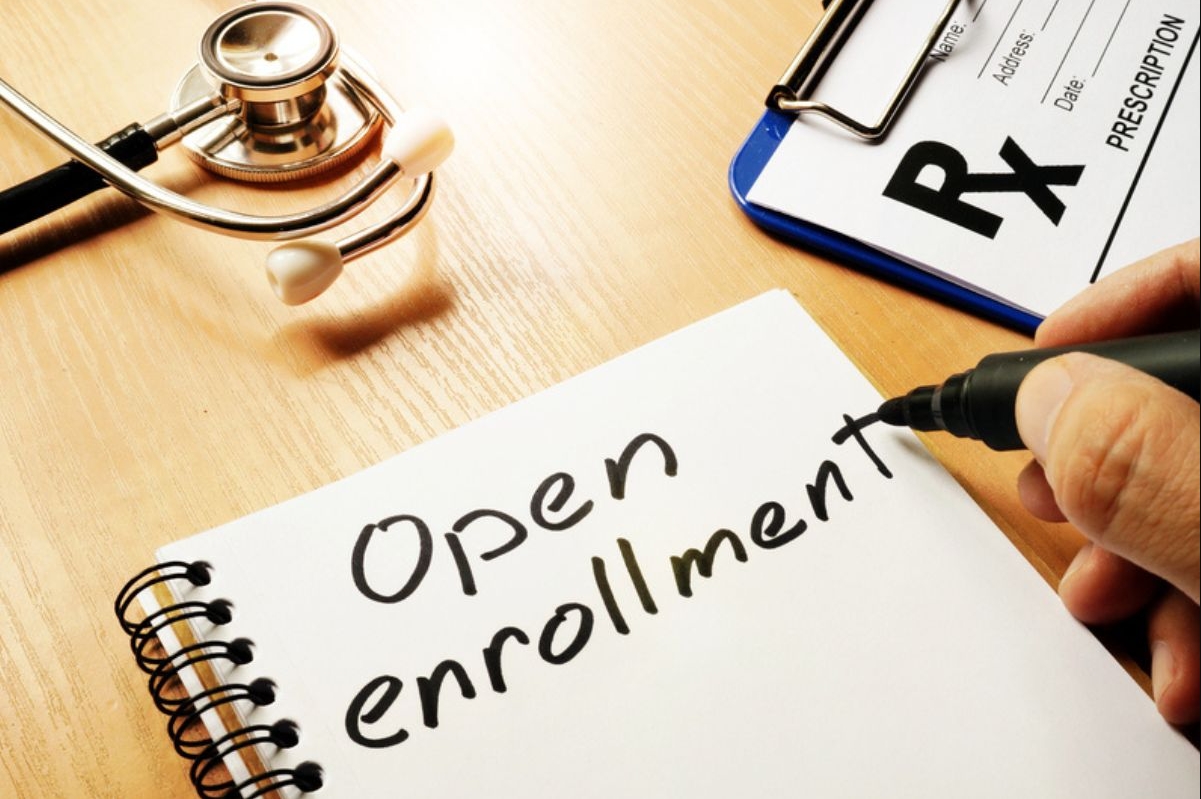 paper with open enrollment written on it