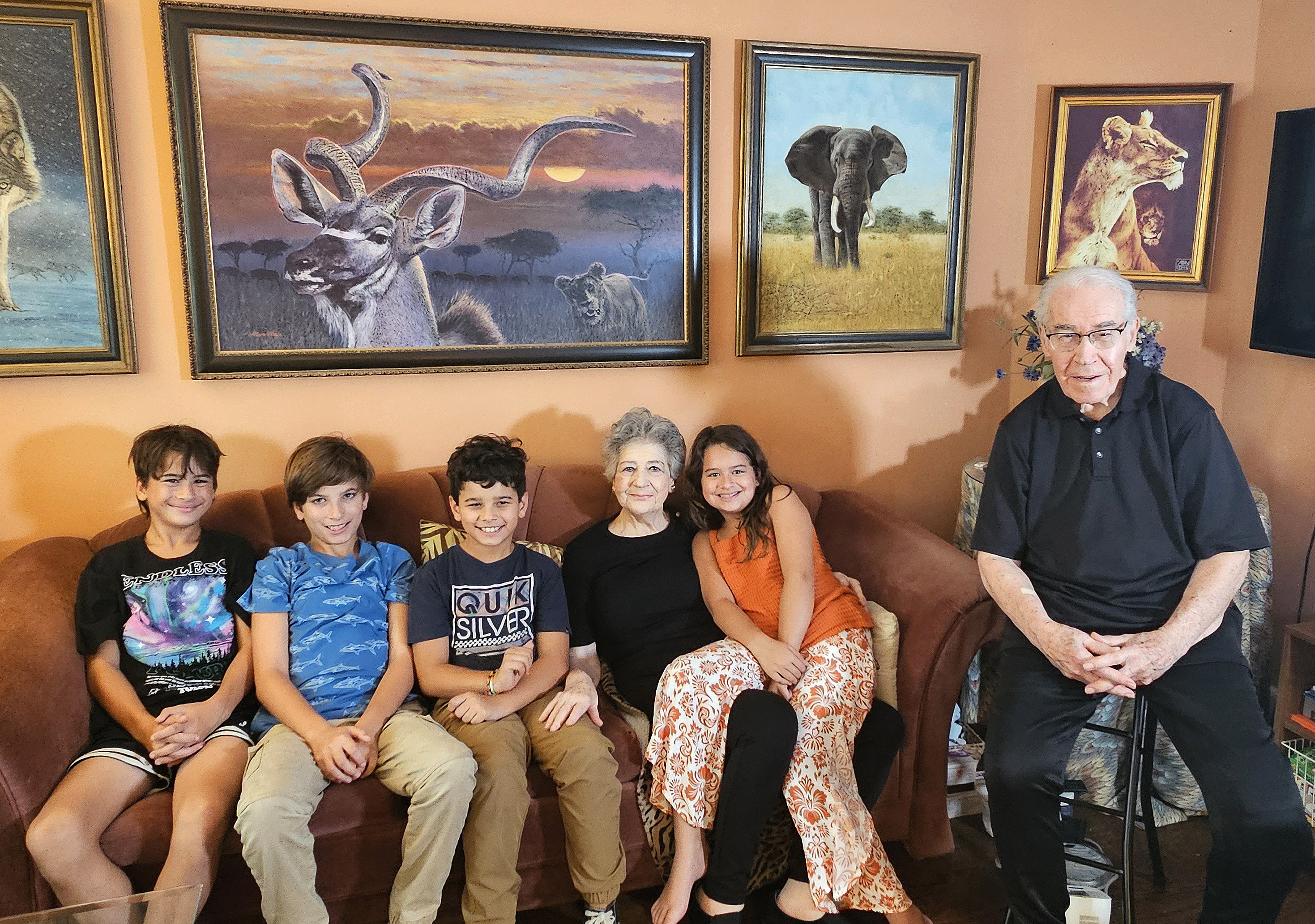 image of people on a couch and chair