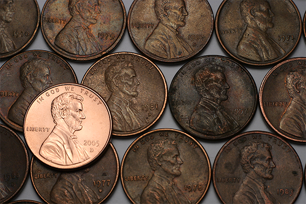Photo of different generations of the American Penny.