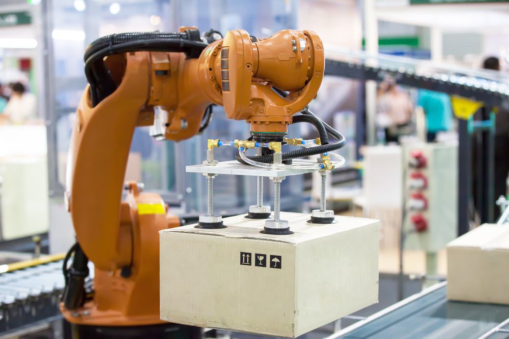 a orange robot working
