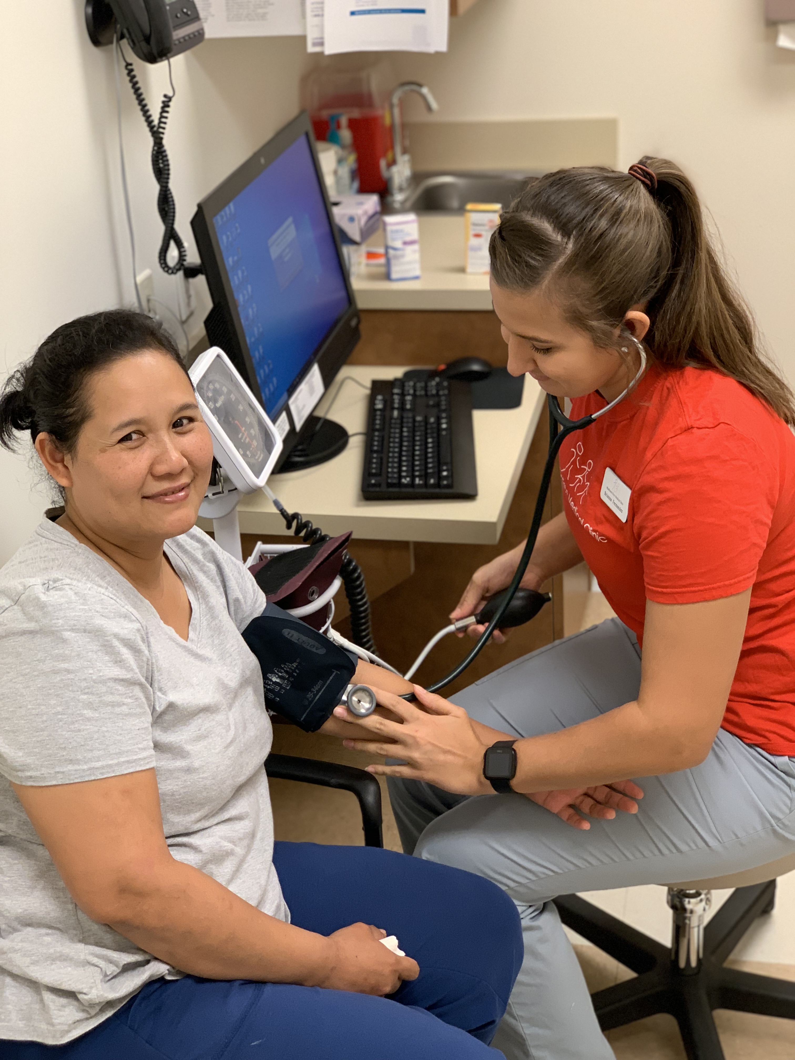 woman getting her blood pressure taken