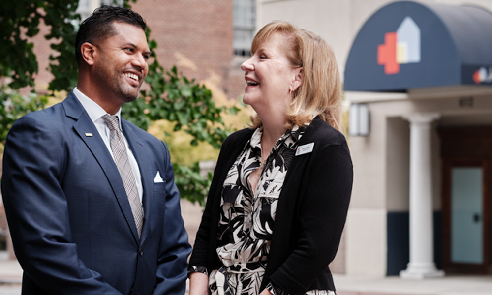 TowneBank banker and small business owner discussing business banking options together