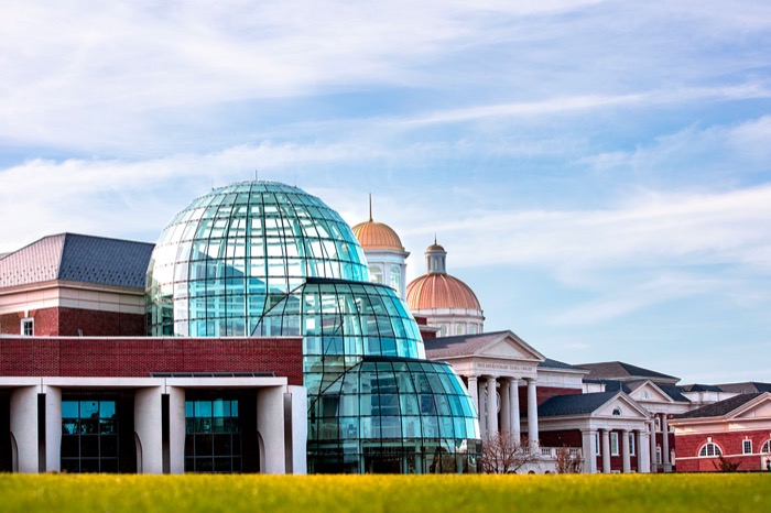 Exterior photo of large glass domed building