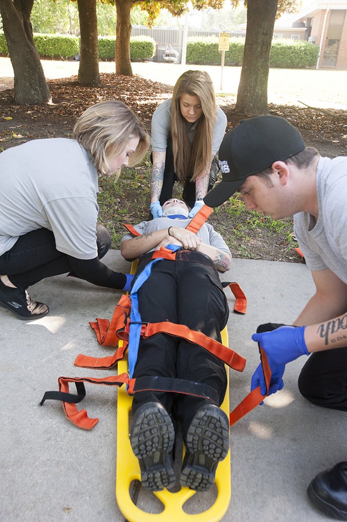 Students practice their skills at the Stanley Griggs EMS Training
                  Center.